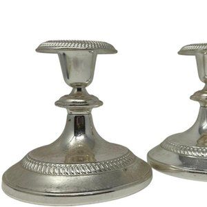 Pair of Silver Plated Zinc Candlesticks